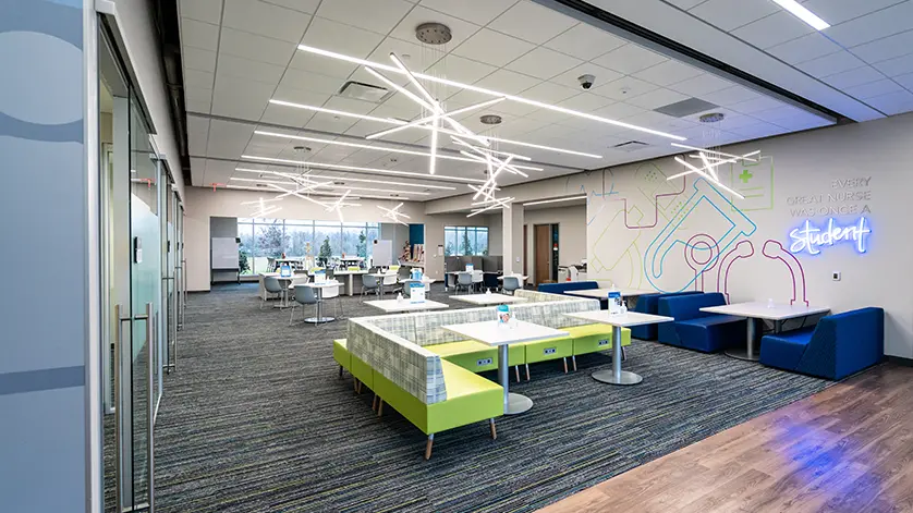 Student commons area in Galen Louisville campus, with comfy chairs and tables